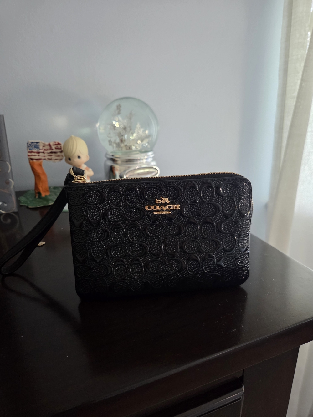 Coach Black Embossed Leather Zip Wristlet with Gold Logo